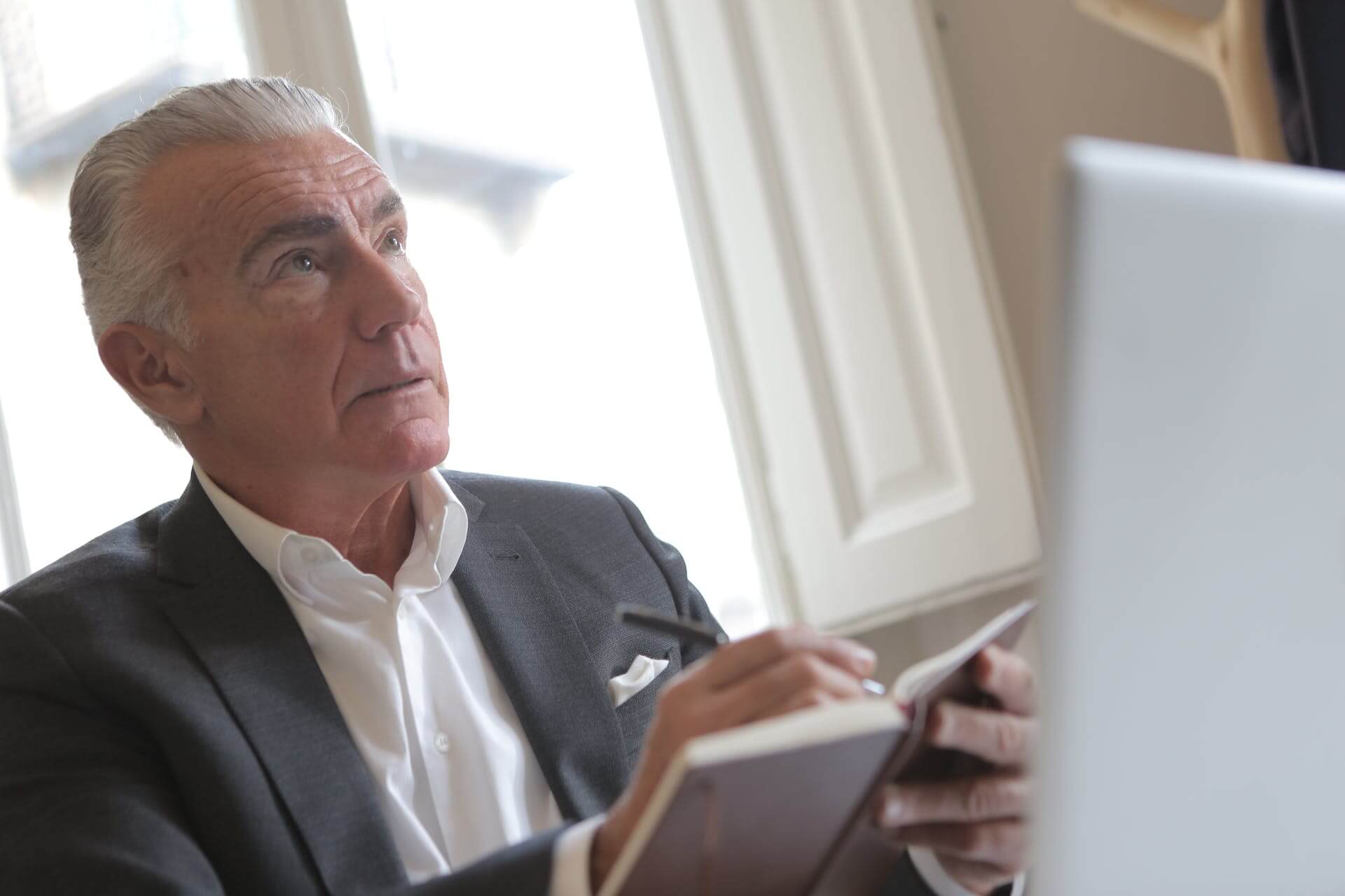 Business man using an ADHD Planner