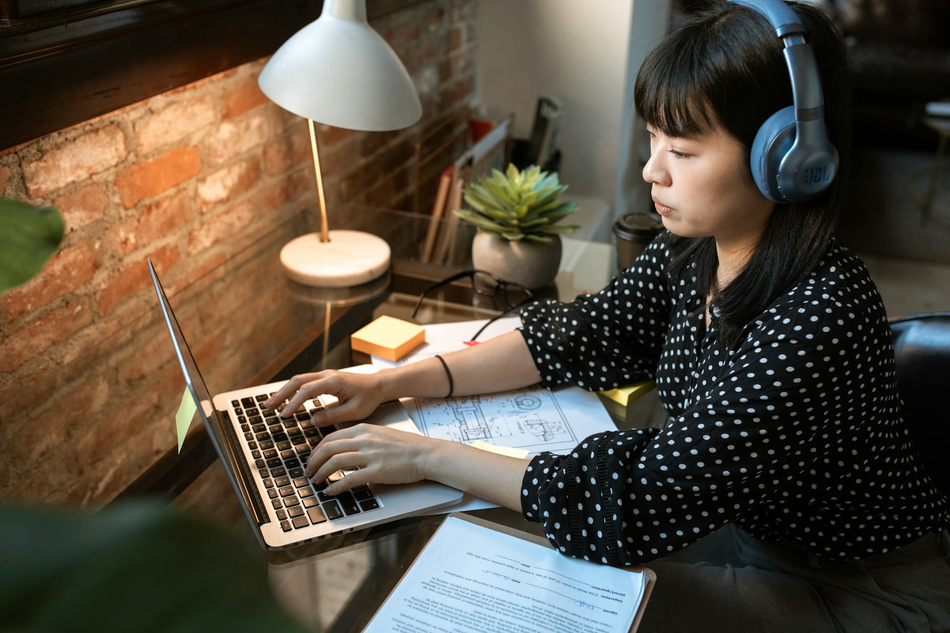 Focused woman working on her laptop